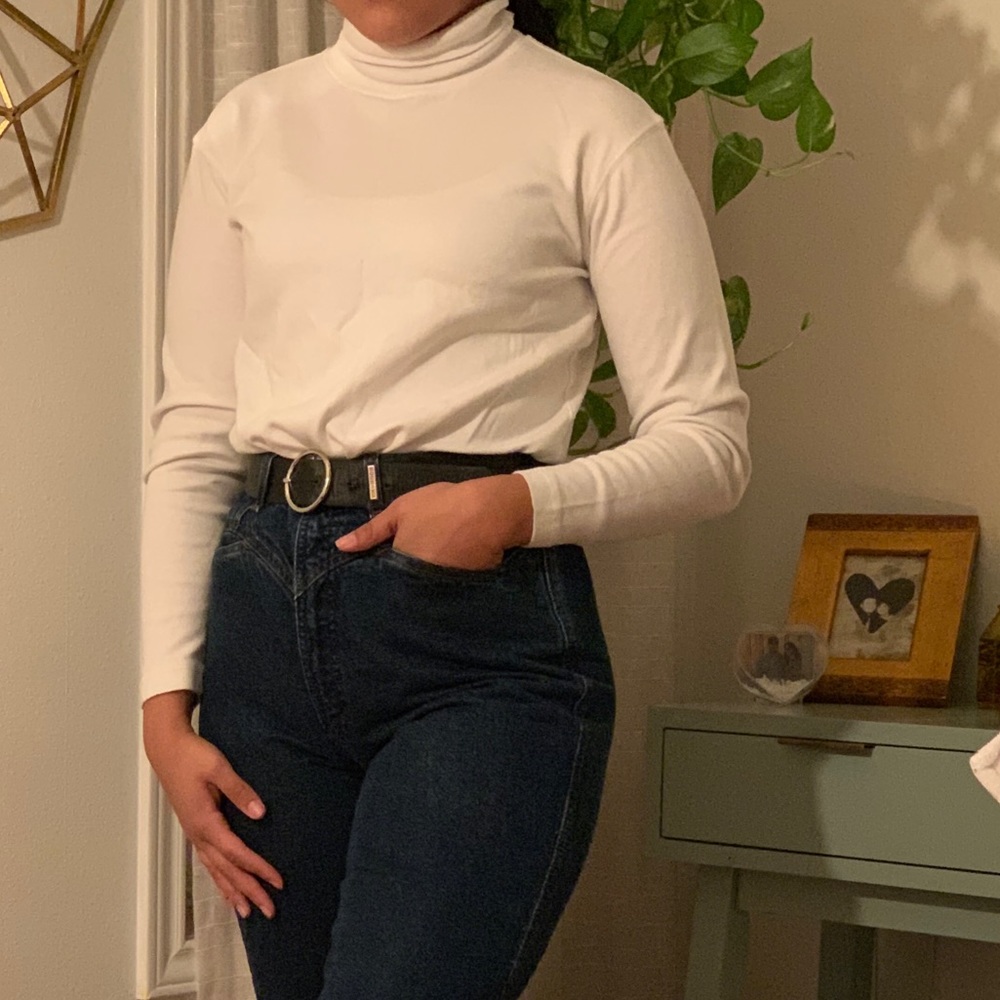 White Turtle neck.